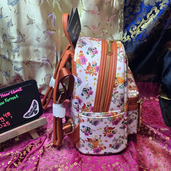 Loungefly Disney Bambi, Thumper, and Flower all-over-print (AOP) mini backpack